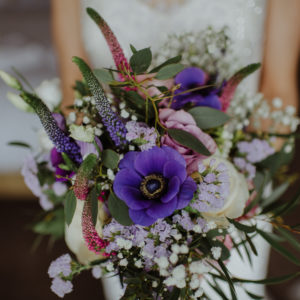 Purple spring wedding bouquet rustic and wild