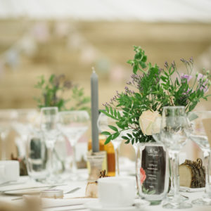 Greenery bottles table flowers centrepieces