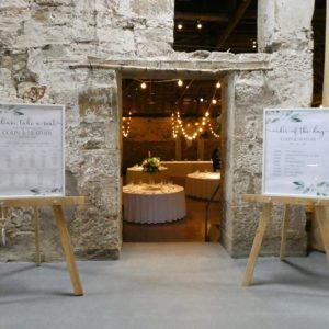 Order of the Day and Table Plan on Rustic Easels